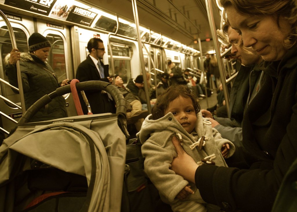 Dalia and mommy on the subway train