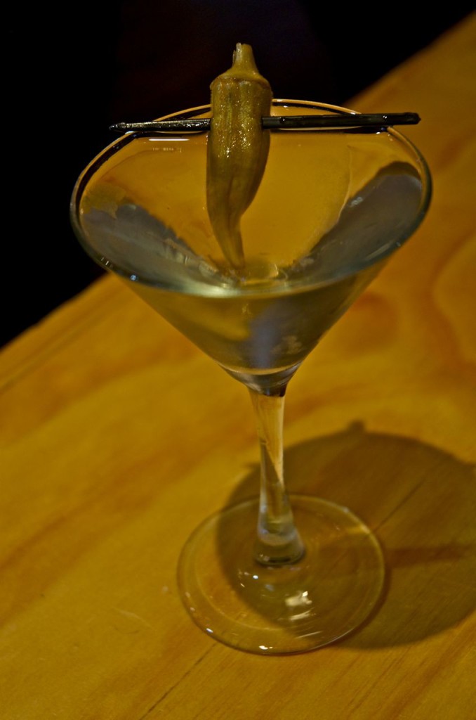 martini with a pickled okra